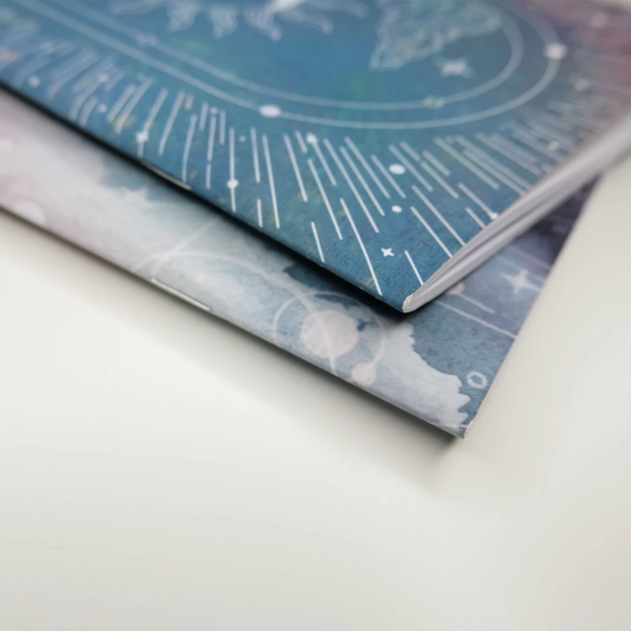 Set of two stapled notebooks